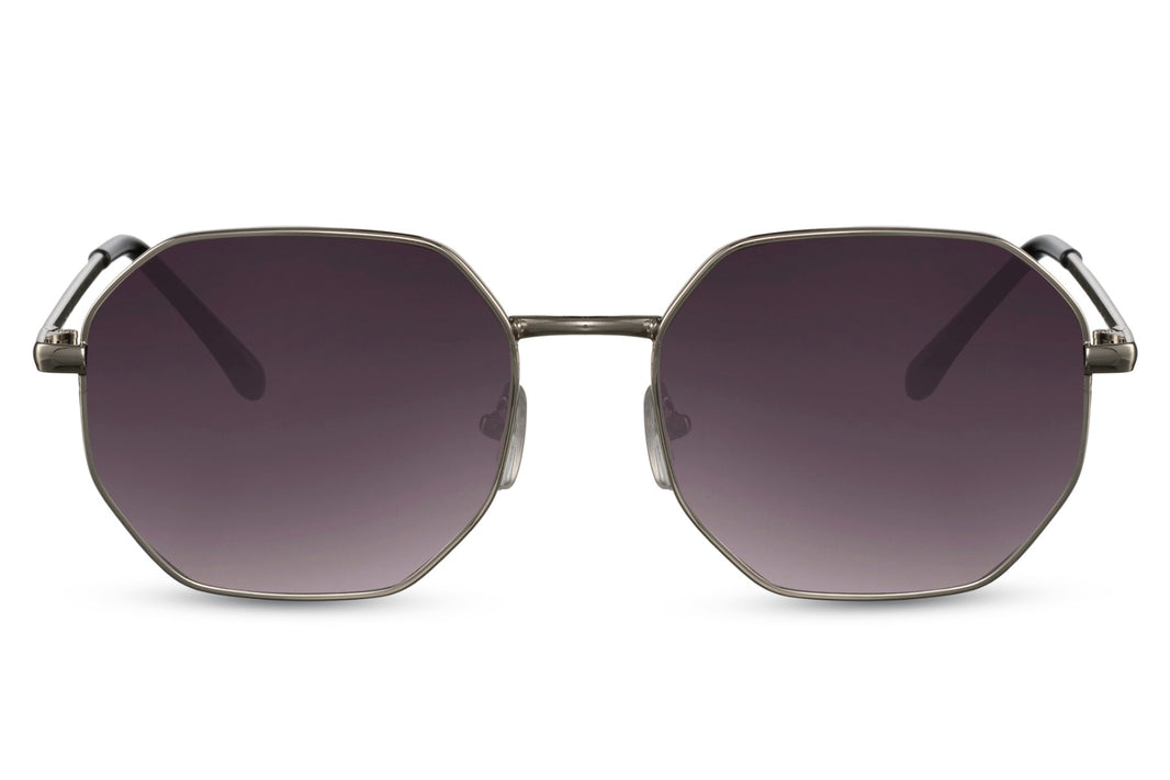 Gafas de sol para mujer Dorelion Aura con montura plateada y detalles en color cobre, lentes negras polarizadas y protección UV400.