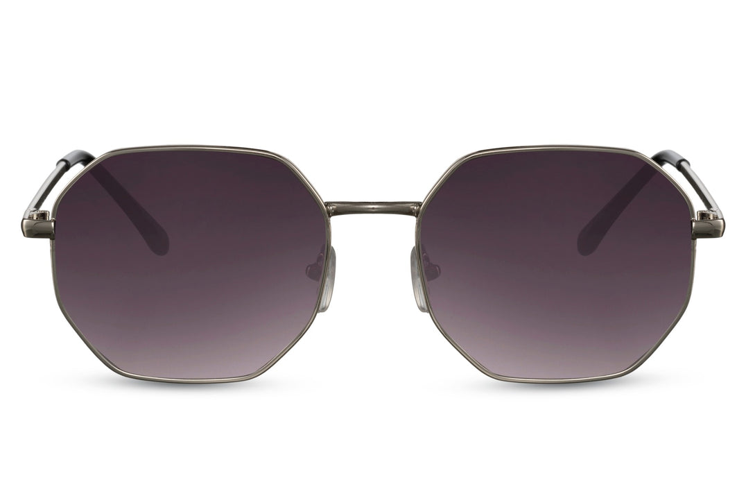 Gafas de sol para mujer Dorelion Aura con montura plateada y detalles en color cobre, lentes negras polarizadas y protección UV400.