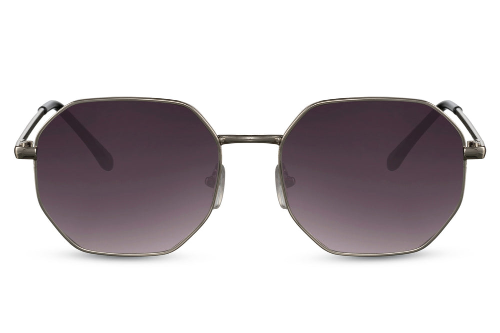 Gafas de sol para mujer Dorelion Aura con montura plateada y detalles en color cobre, lentes negras polarizadas y protección UV400.